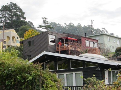 Guillaume and Freddy under the bright red awning