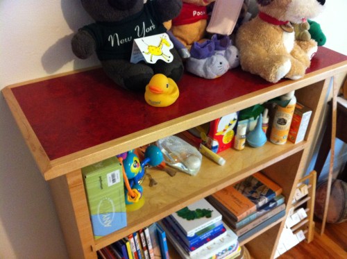 maple bookshelf with red marmoleum top