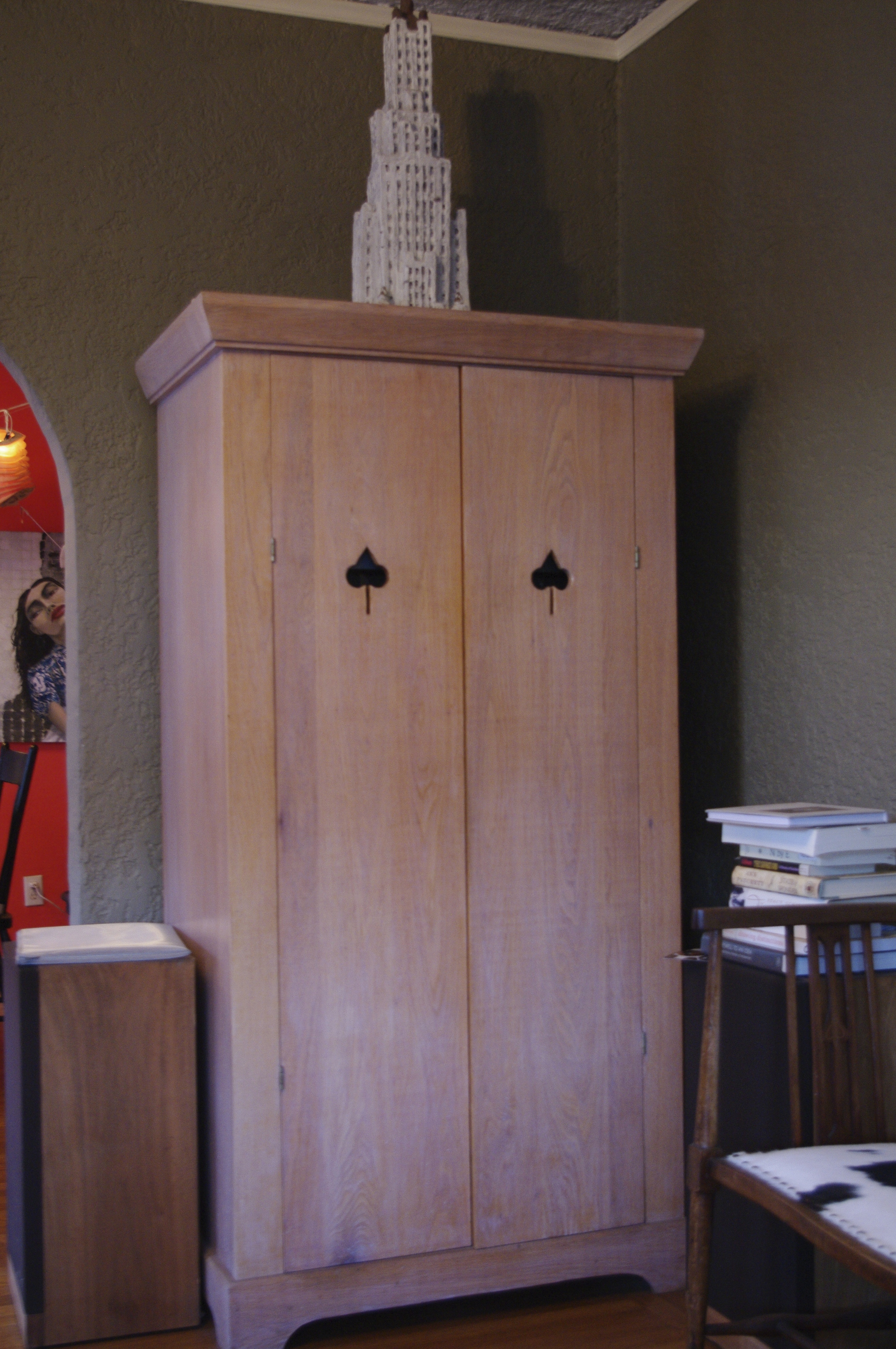 spade cutout pulls (Armoire by Dickson Schneider I believe) 