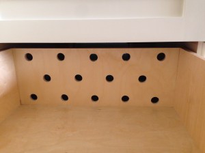 Holes drilled to vent drawers to the outside. California living!