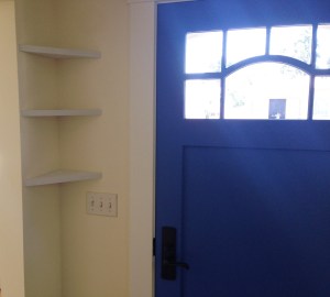 Nice clean floating corner shelves by Shada Build and Design