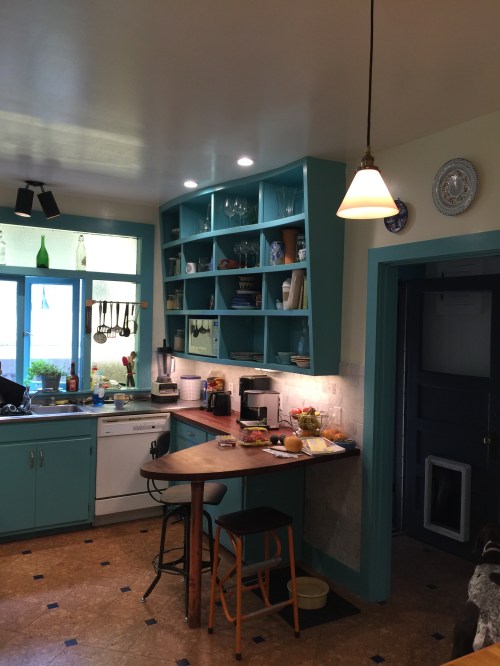 Dark Stained Cherry Peninsula & Curvy Shelves